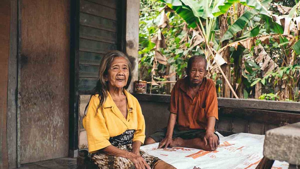 Elderly female and male sitting who need language access services under Section 1557 of the ACA