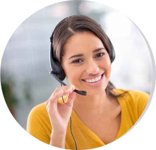 Smiling female OPI interpreter wearing a yellow shirt and headset
